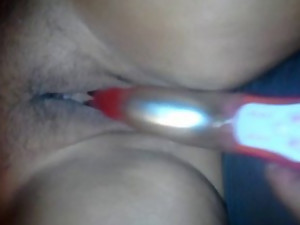 Sex-toy in her pussy