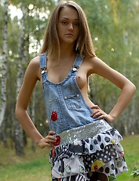  Zemani.com Aurora - Cute young hotty takes off her blue jeans sundress and positions exposed in the birchwood.