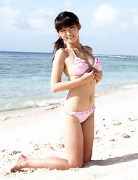 Yuka Kosaka Pleasant busty gravure chick having fun at the beach in her bikini